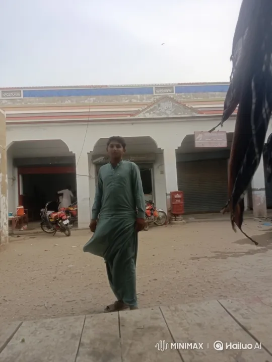 Young Man Observes Slow-Drive of Truck in Town – AI Generated Video | Hailuo AI