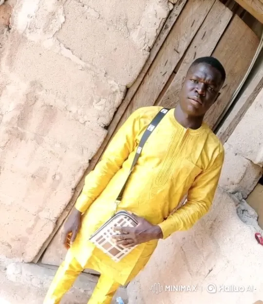 Young Man in Traditional Attire Stands Calmly – AI Generated Video | Hailuo AI