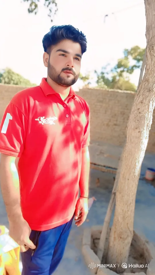 Young Man in Red Polo Shirt Turns to Camera – AI Generated Video | Hailuo AI