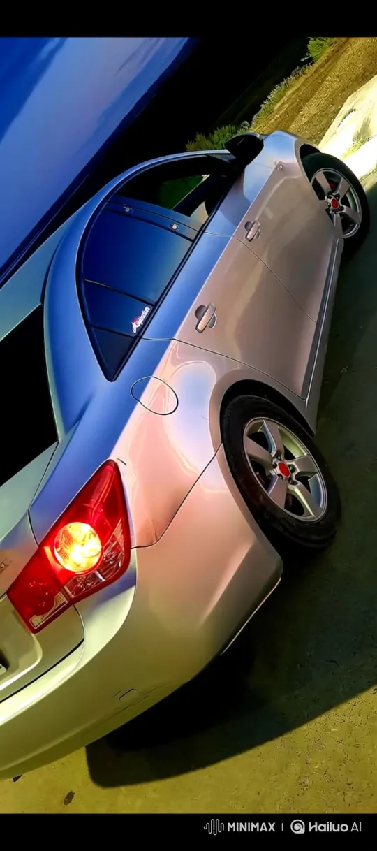 Silver Sedan Demonstrates Smooth Air Suspension Lowering – AI Generated Video | Hailuo AI