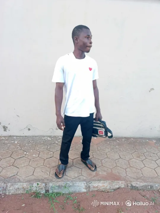 Young Man Performs Rhythmic Dance on Sidewalk – AI Generated Video | Hailuo AI