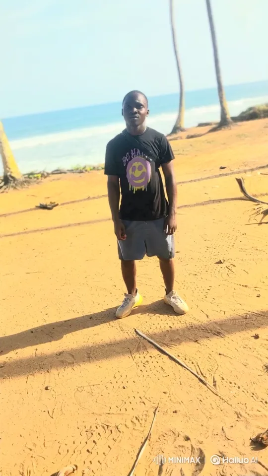 Young Man Reflecting by the Ocean on a Sunny Beach – AI Generated Video | Hailuo AI