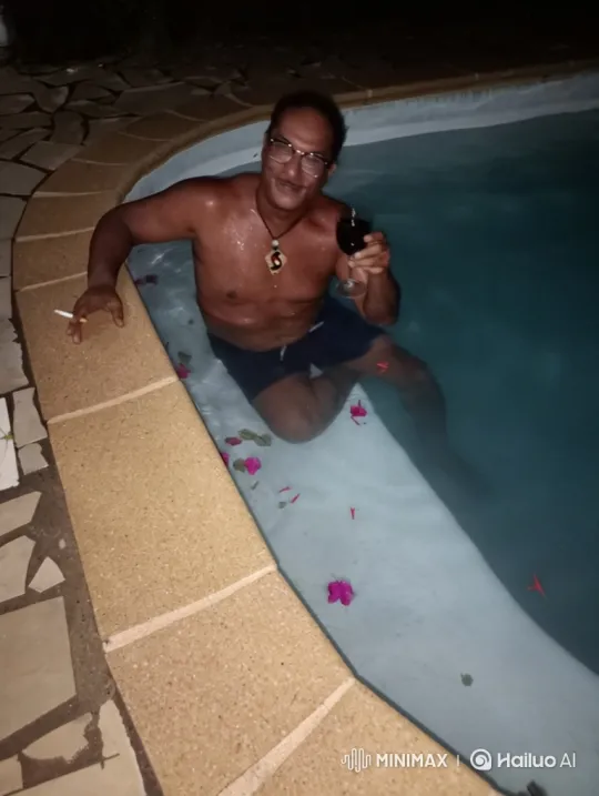 Man with Wine and Cigarette in Surreal Night Pool Scene – AI Generated Video | Hailuo AI