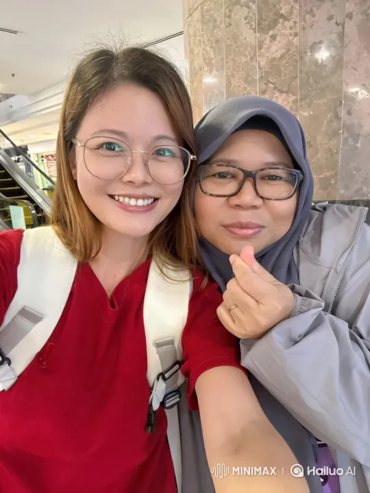Two Women Posed for a Selfie with Joyful Expressions – AI Generated Video | Hailuo AI