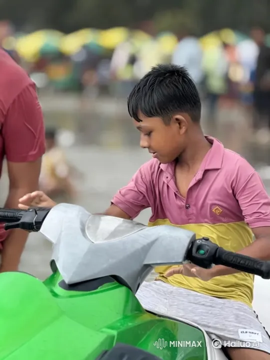 Young Boy Enjoys Leisure on Watercraft, Engaged with Smartphone – AI Generated Video | Hailuo AI