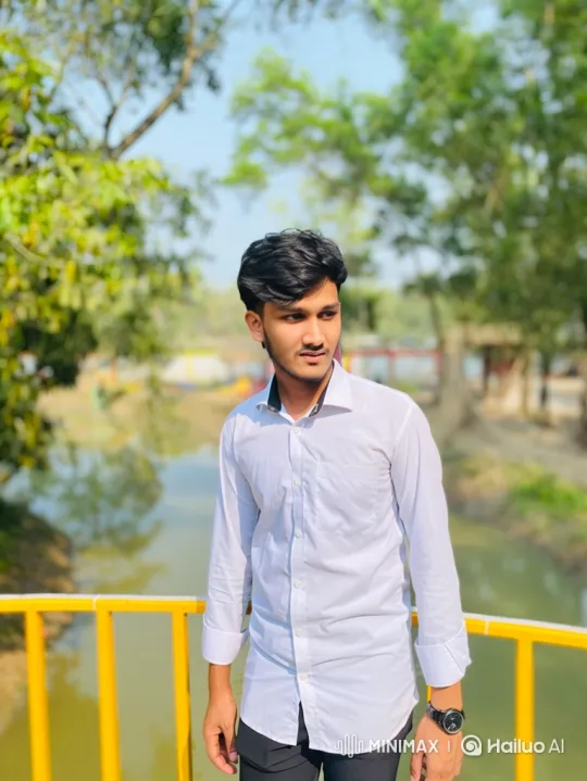 Young Man on Bridge Contemplates, Smiles at Camera – AI Generated Video | Hailuo AI