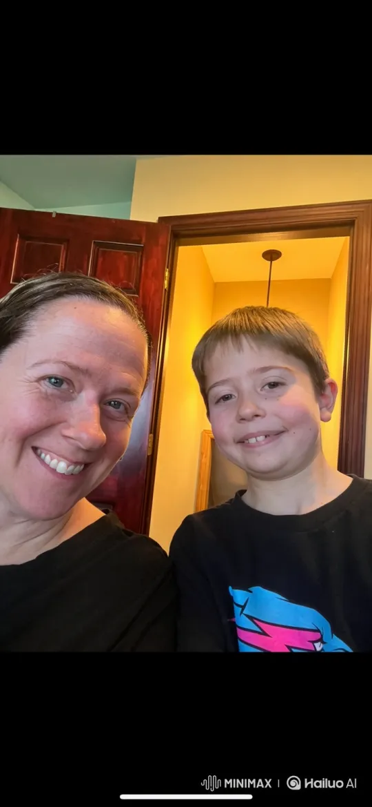 Woman and Boy Share Tender Indoor Hug – AI Generated Video | Hailuo AI
