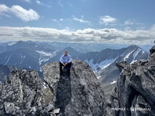 Man Contemplates Solitude on Mountain Peak – AI Generated Video | Hailuo AI