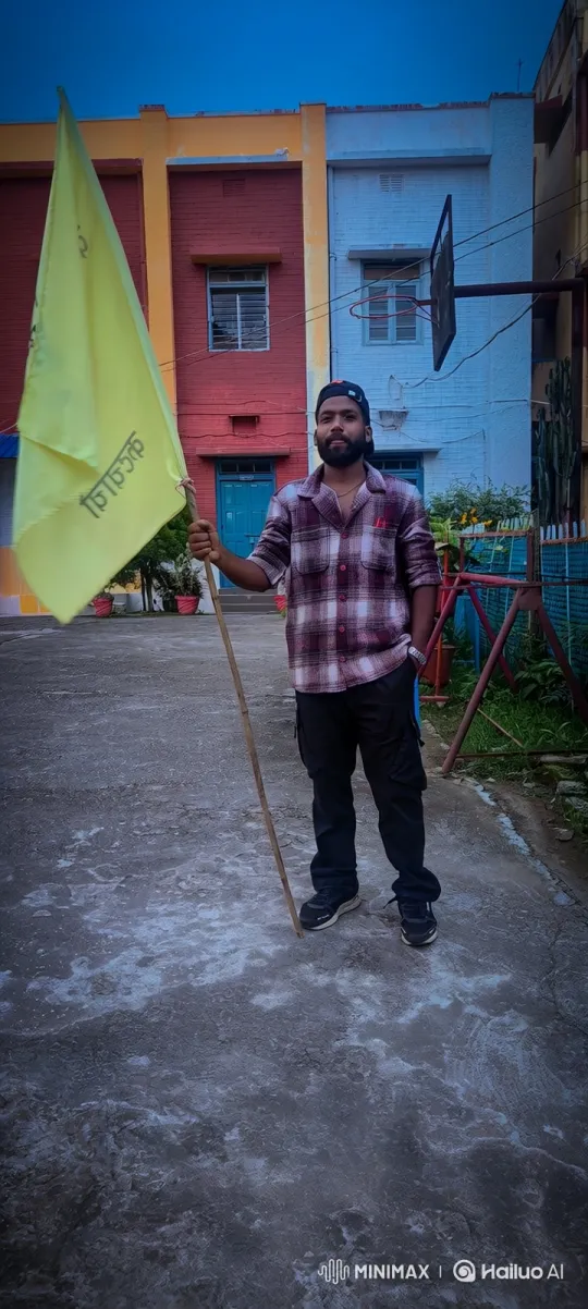 Man Stands Confidently with Flag in Courtyard at Dusk – AI Generated Video | Hailuo AI