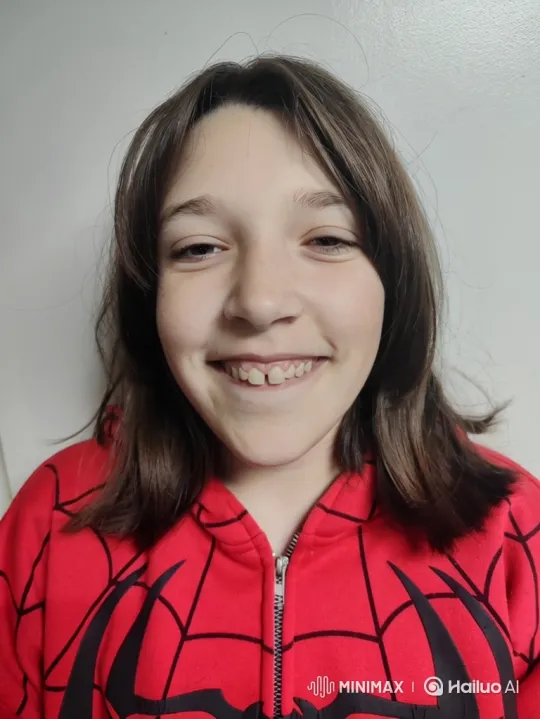 Young Person Smiles and Turns Away in Video – AI Generated Video | Hailuo AI