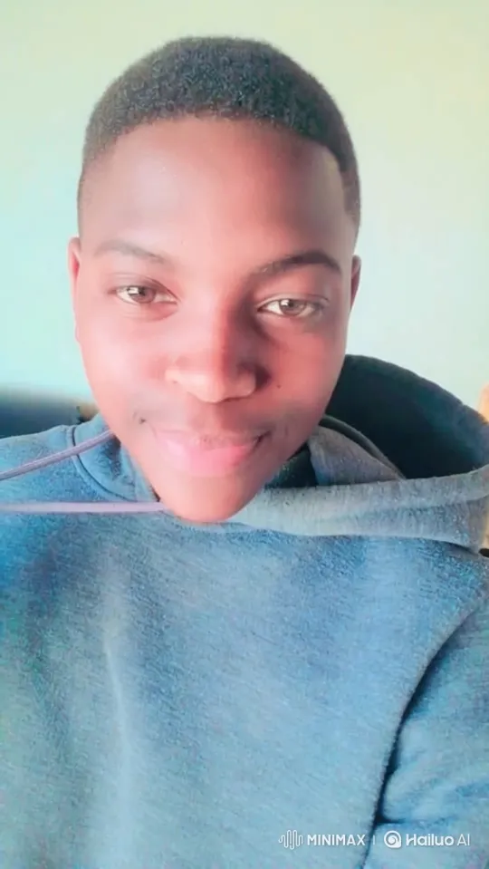 Young Person in Blue Hoodie: Slow Tracking Shot – AI Generated Video | Hailuo AI