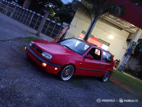 Red Hatchback Lowers Smoothly on Dusk Gravel – AI Generated Video | Hailuo AI