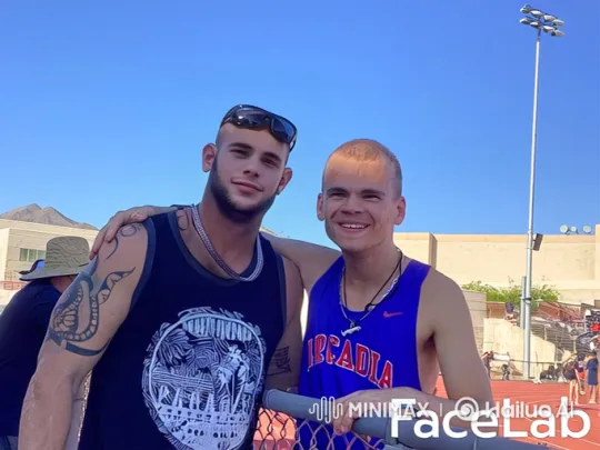 Two Cats Enjoying a Sunny Day at a Track and Field Venue – AI Generated Video | Hailuo AI