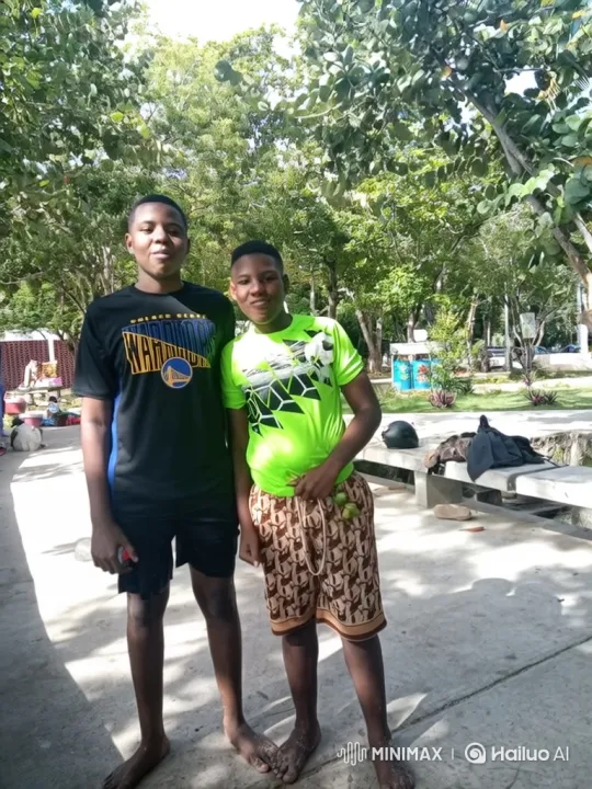 Two Boys Dance Joyfully in a Park – AI Generated Video | Hailuo AI