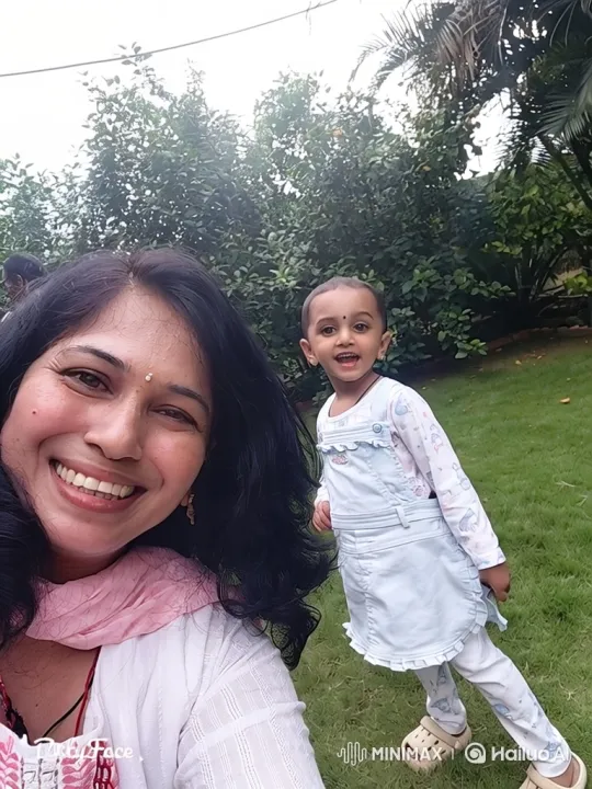 Joyful Mother and Child Captured in Candid Selfie Moment – AI Generated Video | Hailuo AI