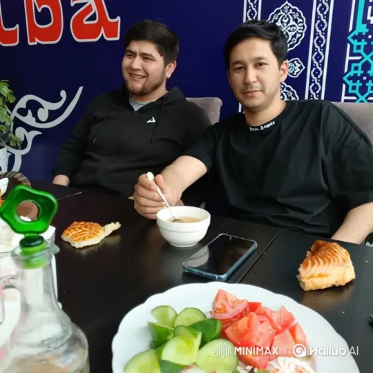 Two Friends Enjoying a Meal in a Restaurant – AI Generated Video | Hailuo AI