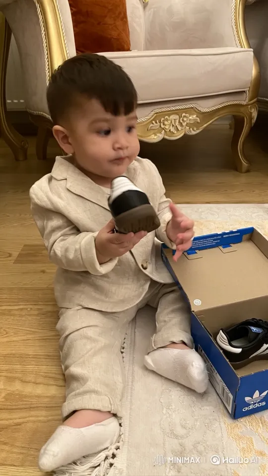 Toddler Joyfully Learns to Wear Shoes – AI Generated Video | Hailuo AI