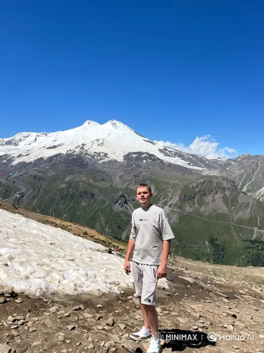 Young Man Overcomes Avalanche, Celebrates Triumphantly – AI Generated Video | Hailuo AI
