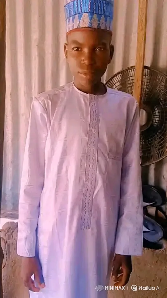 Young Man in Embroidered Garment with Gentle Demeanor – AI Generated Video | Hailuo AI