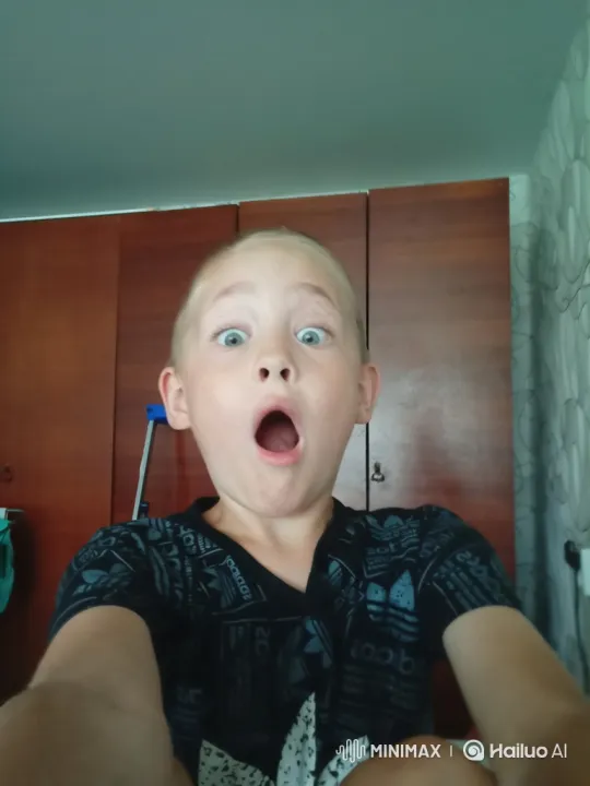 Boy Mimics Surprise, Turns to Reveal Comical Smoke Trick – AI Generated Video | Hailuo AI
