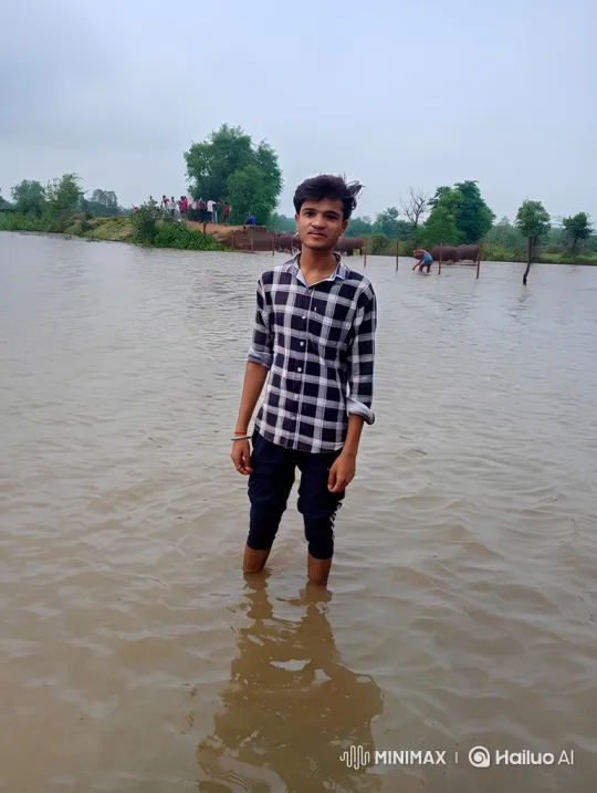 Young Man in Flooded Landscape with Steady Smile – AI Generated Video | Hailuo AI