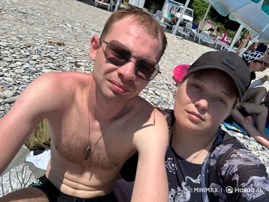 Family Embraces on Beach in Sunny Hug – AI Generated Video | Hailuo AI