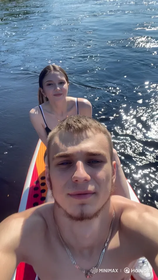 Family Enjoying Serenity on a Paddleboard – AI Generated Video | Hailuo AI