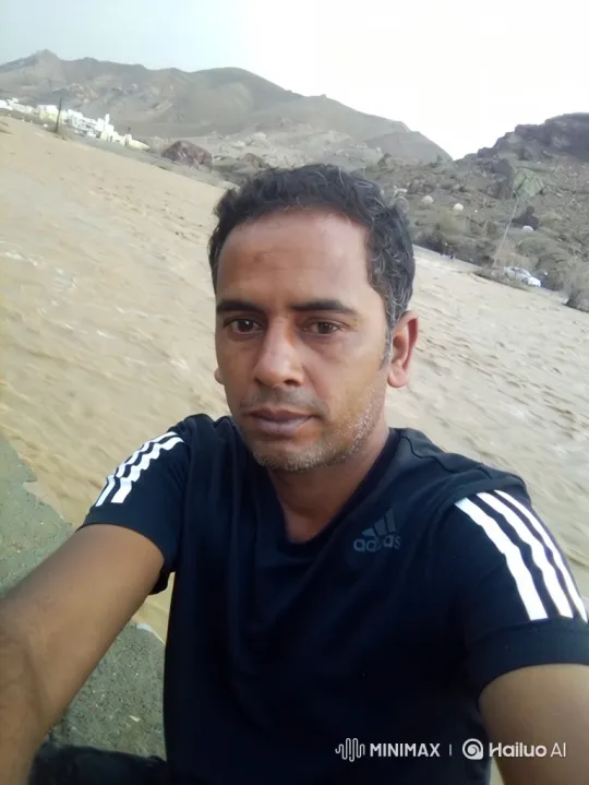 Couple Shares Quiet Moment in Mountainous Landscape – AI Generated Video | Hailuo AI