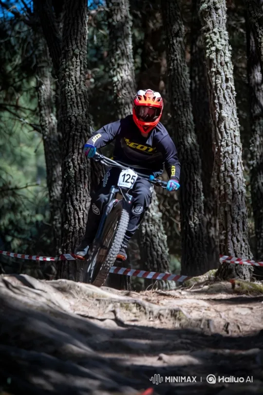 Downhill Mountain Biker Navigates Forest Trail – AI Generated Video | Hailuo AI
