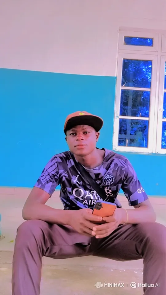 Young Man Reflects Calmly in a Pastel-Hued Room – AI Generated Video | Hailuo AI