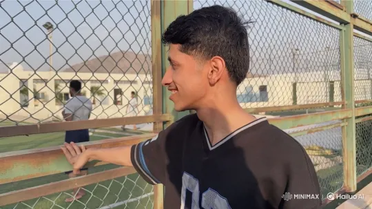 Young Man and Female Officer Meet at Fence – AI Generated Video | Hailuo AI