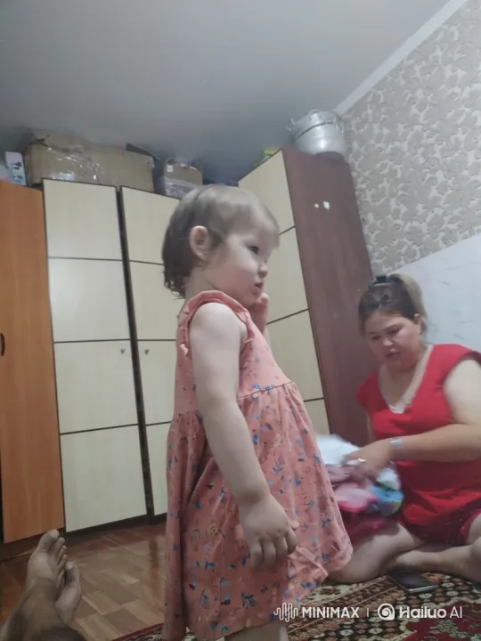 Young Girl Playfully Engages in Mock Fight with Man's Feet – AI Generated Video | Hailuo AI