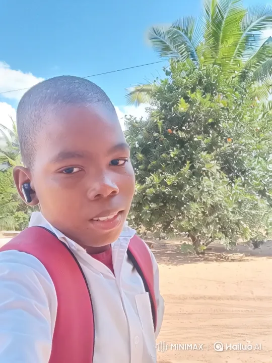 Boy with Buzz Cut Drives White Electric Sedan on Dirt Road – AI Generated Video | Hailuo AI