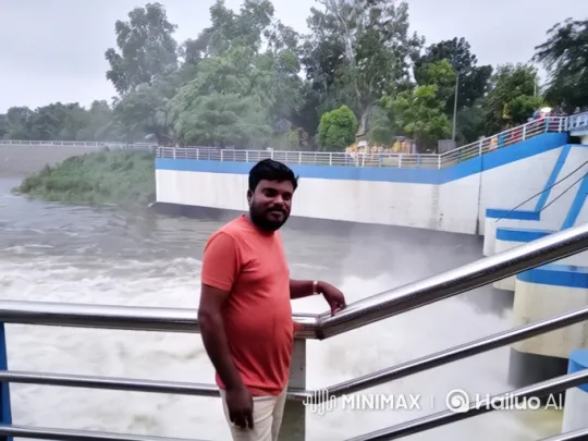 Man at Dam with Powerful Water Release – AI Generated Video | Hailuo AI