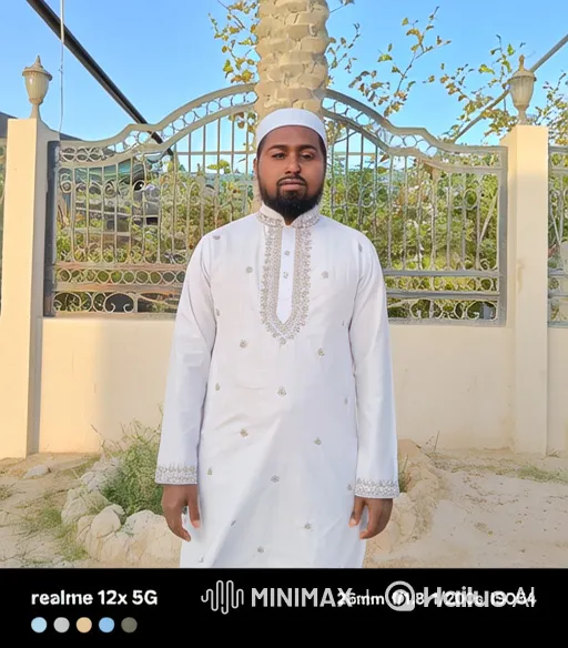 Man in White Embroidered Tunic Walks Out of Frame – AI Generated Video | Hailuo AI