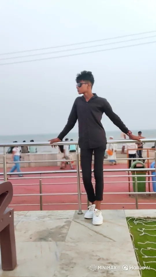 Young Man Meets Narendra Modi Impersonator on Seaside Promenade – AI Generated Video | Hailuo AI