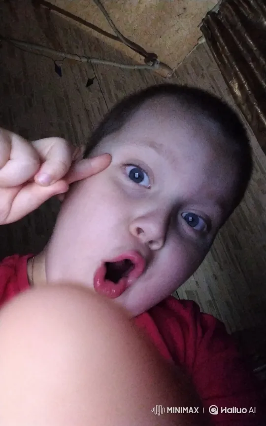 Boy's Silly Face Turns to Sandcastle Building Adventure – AI Generated Video | Hailuo AI
