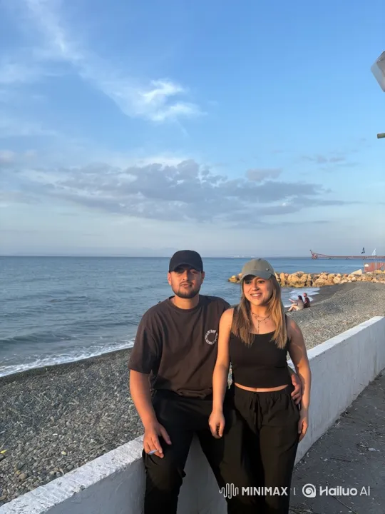 Family Embrace at Serene Seaside Sunset – AI Generated Video | Hailuo AI