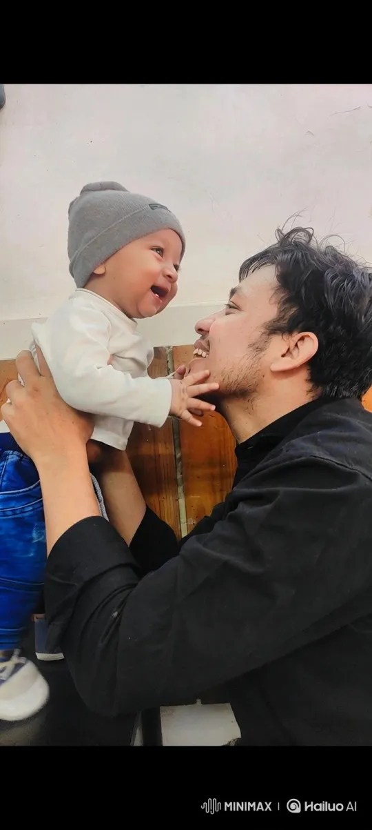 Man and Baby Bond in Joyful Tracking Shot – AI Generated Video | Hailuo AI