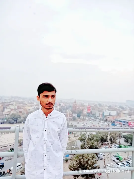 Young Man Reflects on Expansive Cityscape – AI Generated Video | Hailuo AI