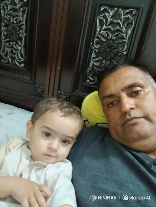 Intimate Moment of Peaceful Rest Between Man and Child – AI Generated Video | Hailuo AI