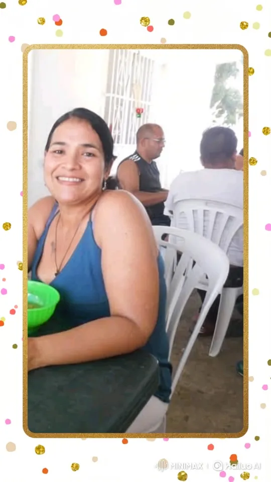 Woman Smiles at Table in Festive Scene – AI Generated Video | Hailuo AI