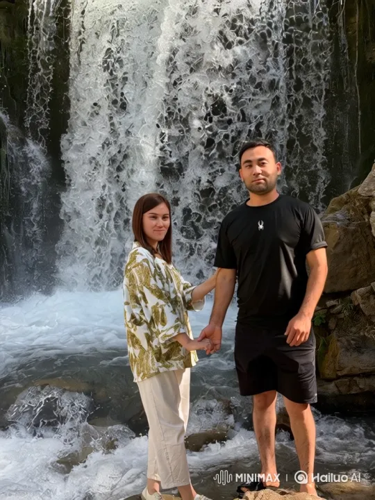 Couple's Serene Moment at Waterfall – AI Generated Video | Hailuo AI