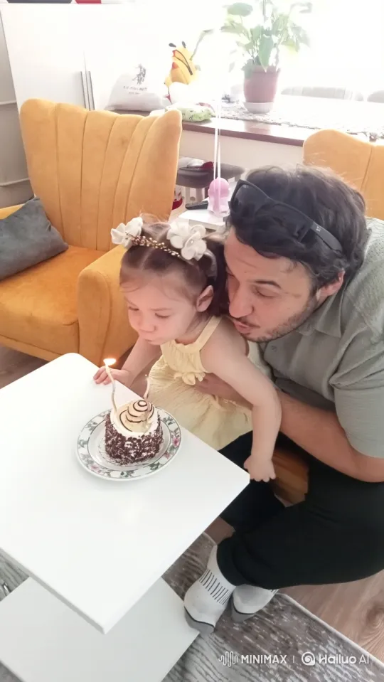 Man and Girl Extinguish Birthday Candle Together – AI Generated Video | Hailuo AI